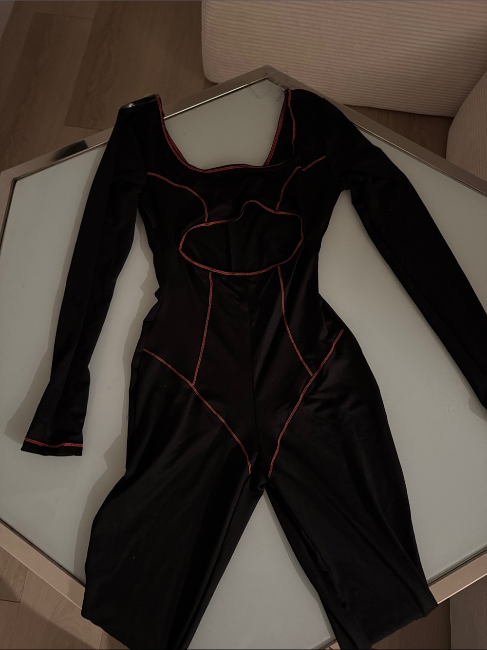 Black Long-Sleeve Jumpsuit with Red Contrast Stitching